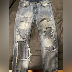 Fashion Nova size 7/29 skinny ripped jeans.